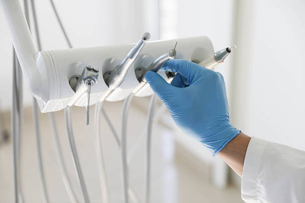 Professional Tooth Extraction technician working in Janesville, CA